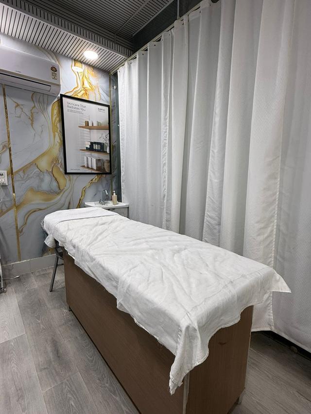 Private treatment room for facials, waxing and skin treatments, prepared with fresh linen for every client